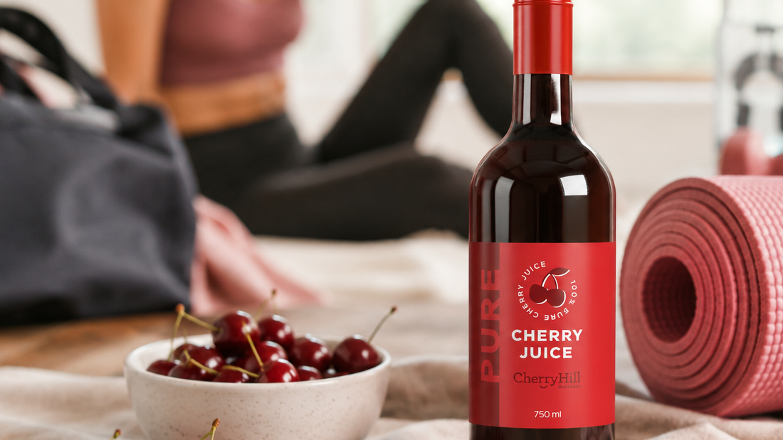 Bottle of Pure Cherry Juice with cherries and a person exercising in the background